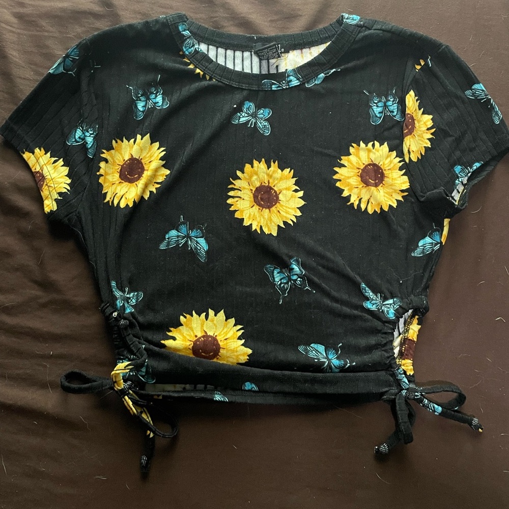 Large black Rue 21 crop top with sunflowers and blue monarch butterflies